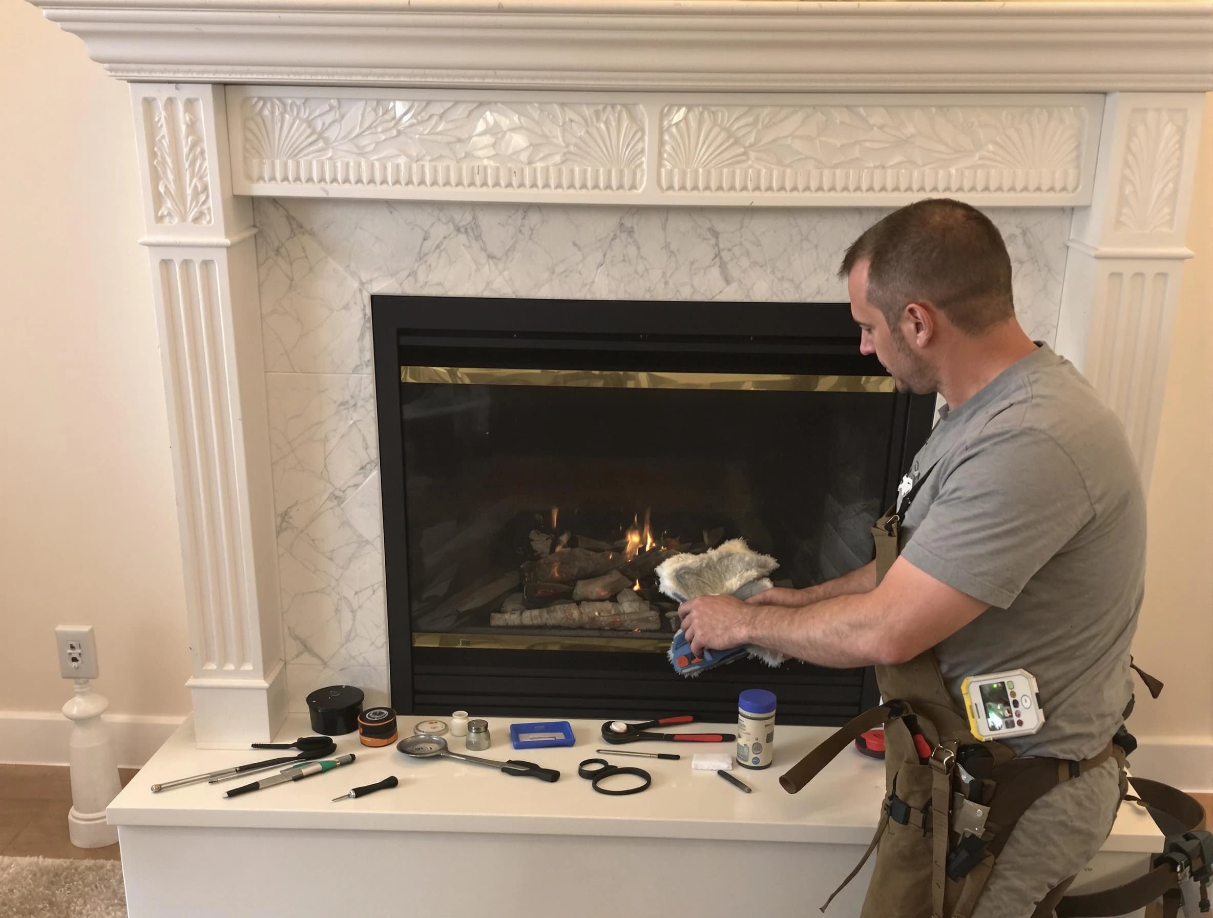 Kearns Chimney Sweep performing fireplace maintenance in Kearns, UT